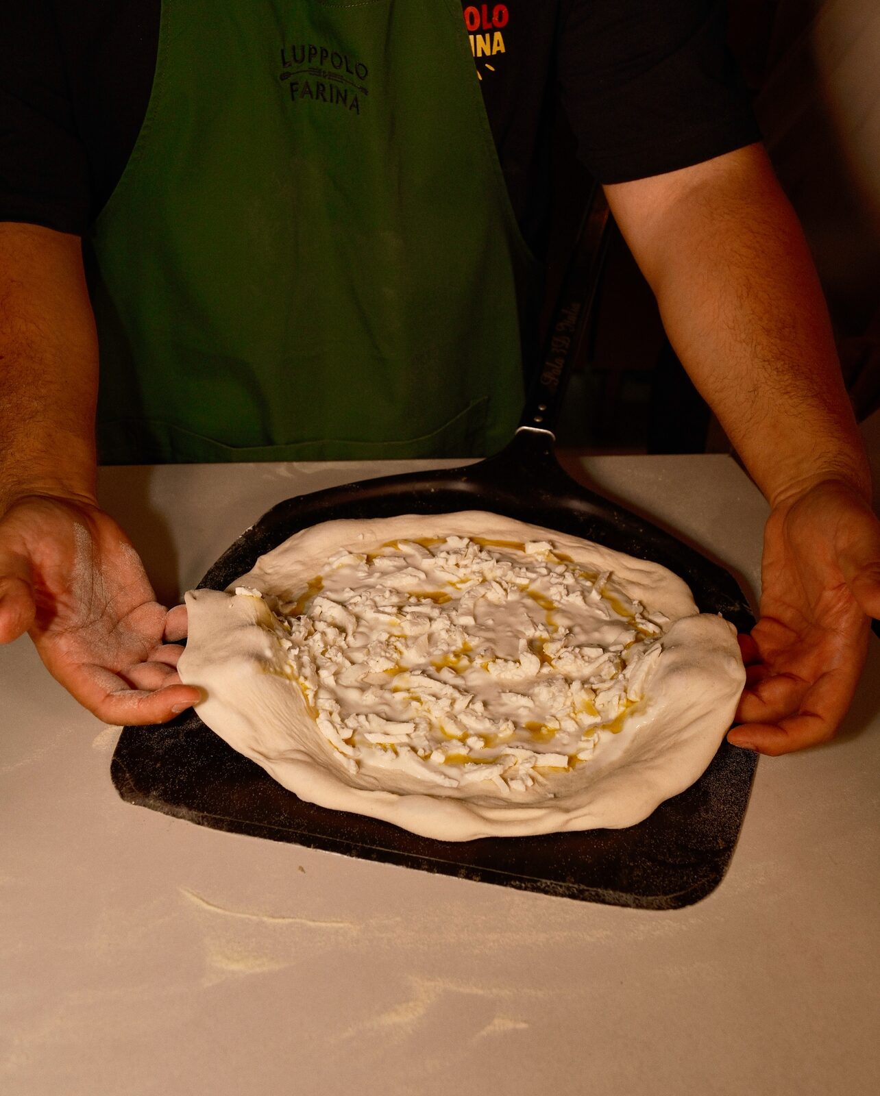 Il pizzaiolo con la pala